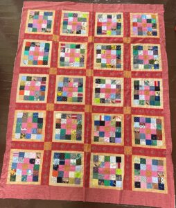 Multicolored quilt in squares